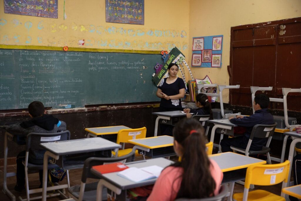 Figure 2: Grade school students in Paraguay learning in greater comfort with new air conditioning made possible through HIVE's support.